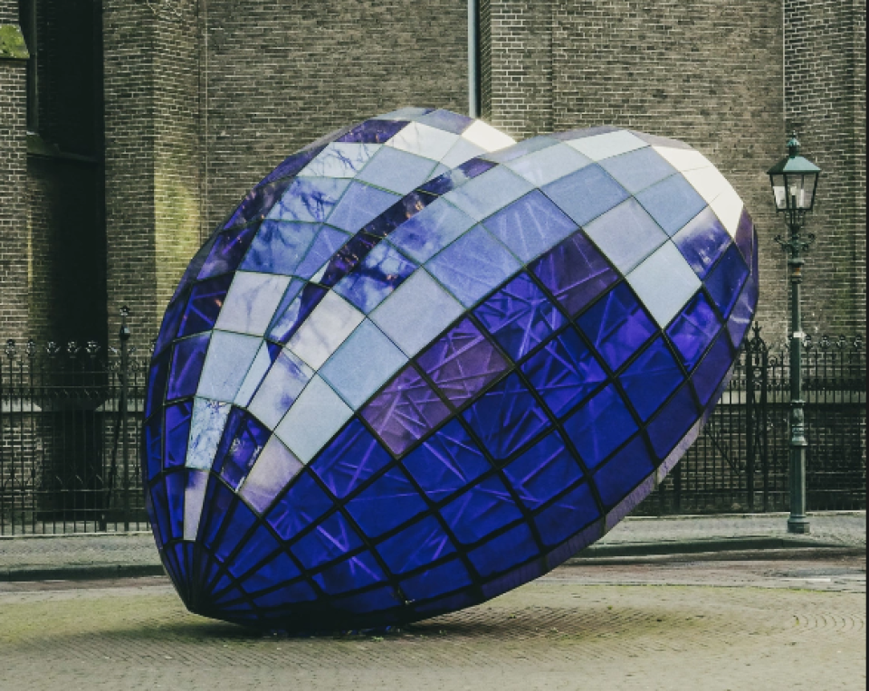 <p><strong>Het Blauwe Hart &ndash; The Blue Heart of Delft 💙</strong>&nbsp;A&nbsp;<strong>modern sculpture</strong>&nbsp;in the heart of Delft,&nbsp;<strong>Het Blauwe Hart (The Blue Heart)</strong>&nbsp;represents&nbsp;<strong>Delft&rsquo;s deep connection to Delft Blue pottery</strong>. 🌟&nbsp;<strong>Why Visit?</strong>✅ A&nbsp;<strong>symbolic art piece</strong>&nbsp;inspired by Delft&rsquo;s famous blue color✅ A great&nbsp;<strong>photo spot</strong>&nbsp;📸✅ Located in a&nbsp;<strong>lively area with caf&eacute;s &amp; shops</strong>&nbsp;💡&nbsp;<strong>Fun Fact:</strong>&nbsp;The sculpture was designed by&nbsp;<strong>Jeroen and Marcel Baas</strong>&nbsp;and is made of&nbsp;<strong>blue glass panels shaped like a heart</strong>! 📍&nbsp;<strong>See Delft&rsquo;s modern artistic side at Het Blauwe Hart.</strong></p>