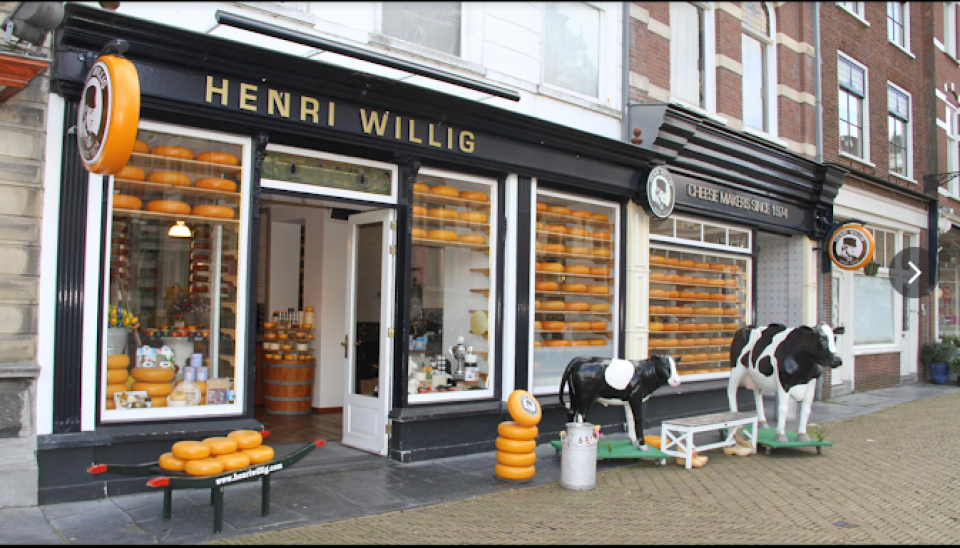<h3><strong>Henri Willig Kaas Delft &ndash; A Cheese Lover&rsquo;s Paradise 🧀</strong></h3>
<p>No trip to the Netherlands is complete without trying <strong>Dutch cheese</strong>, and <strong>Henri Willig Kaas</strong> is <strong>one of the best cheese shops in Delft</strong>.</p>
<p>🌟 <strong>Why Visit?</strong><br>✅ Sample <strong>award-winning Dutch cheeses</strong> 🧀<br>✅ Find <strong>flavored cheeses like truffle, cumin, and pesto</strong><br>✅ A great place for <strong>souvenirs to take home</strong></p>
<p>💡 <strong>Fun Fact:</strong> Henri Willig has been <strong>making traditional Dutch cheese for over 50 years</strong>, using <strong>authentic family recipes</strong>!</p>
<p>📍 <strong>Indulge in Delft&rsquo;s best cheese at Henri Willig Kaas.</strong></p>