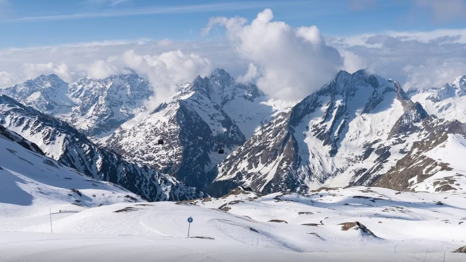 <h4>Rare Late Snowstorm Brings Perfect Ski Conditions to the Alps in Mid-May</h4>
<p>The Alps are experiencing an unusual late-season winter outbreak, turning parts of the region back into a snow-covered landscape despite spring conditions just days ago.</p>
<p>While temperatures in lowland areas recently reached around 25&deg;C, the mountains have shifted dramatically back into winter mode over the Ascension Day weekend. In some areas, snowfall could reach up to 1 meter, with snow even falling down to valley levels.</p>
<p>Ski resorts across France, Italy, Austria and Switzerland have reopened slopes, with skiers and snowboarders enjoying what meteorologists describe as exceptionally rare conditions for mid-May.</p>
<p>At elevations around 1,200 meters, significant snow accumulation has already been recorded, with forecasts predicting even more snowfall in the coming days. Saturday is expected to bring the heaviest conditions, with snow potentially reaching down to 800 meters and even affecting parts of southern Germany.</p>
<h3>A rare event not seen in nearly 20 years</h3>
<p>Such a late and intense winter episode is highly unusual. The last comparable event occurred in 2007, when large parts of the Alps and southern Germany briefly turned white in mid-May. However, some forecasts suggest that this current cold spell could even exceed those snowfall levels.</p>
<h3>&ldquo;Ice Saints&rdquo; weather pattern</h3>
<p>Meteorologists link the sudden temperature drop to a well-known seasonal phenomenon called the &ldquo;Ice Saints&rdquo; period, traditionally observed between May 11 and 15. This timeframe is historically associated with a final risk of frost before stable summer weather arrives.</p>
<h3>Travel disruptions and safety concerns</h3>
<p>Several mountain passes may be closed due to hazardous winter conditions, impacting travel across alpine regions. Authorities are also warning of potential risks in forested areas, where heavy, wet snow combined with fully leafed trees can cause branches to break and increase the risk of local damage.</p>
<p>Despite the disruption, for winter sports enthusiasts, the situation has created an unexpected bonus: fresh powder snow and fully operational ski areas in the middle of May&mdash;a rare sight in modern Alpine tourism.</p>
<h4>NEWS - 15.05.2026</h4>