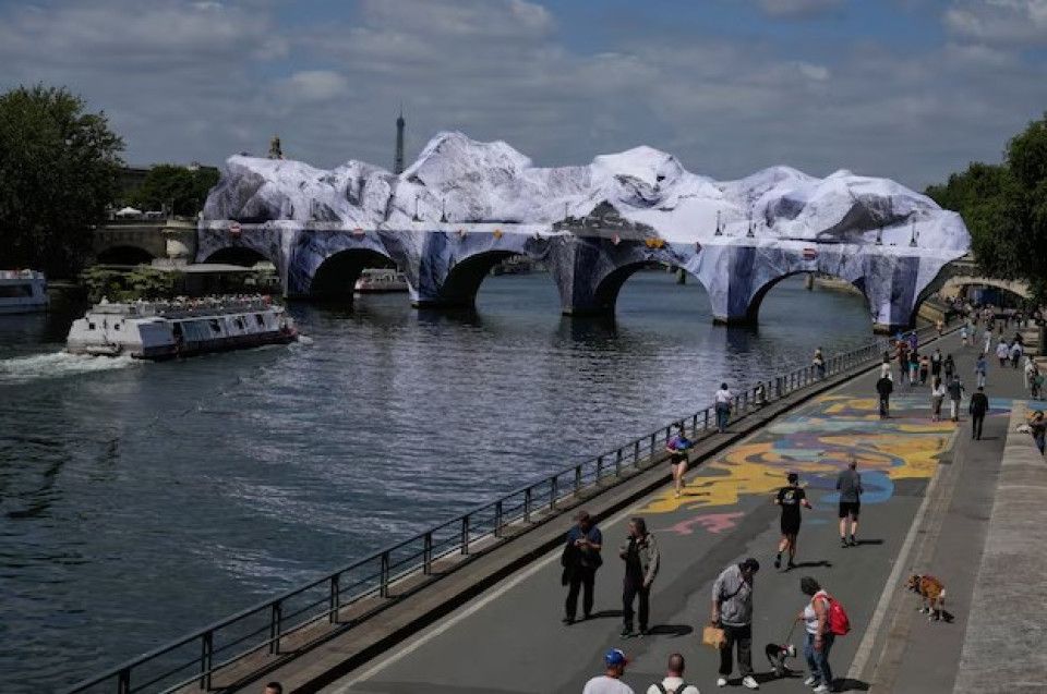 <h4 data-section-id="1wj7nm4" data-start="0" data-end="72">Pont Neuf Transformed Into a Giant Cave-Like Art Installation in Paris</h4>
<p data-start="74" data-end="288">The iconic Pont Neuf in Paris has been dramatically transformed into an immersive art installation by French artist JR.</p>
<p data-start="290" data-end="627">The bridge, usually known for its elegant stone arches over the Seine, has been wrapped in a monumental structure that turns it into a vast artificial cave. The installation, titled <strong data-start="472" data-end="489">&ldquo;La Caverne,&rdquo;</strong> was created as a tribute to the legendary artist duo Christo and Jeanne-Claude, who famously wrapped the same bridge in 1985.</p>
<h3 data-section-id="ia2um0" data-start="629" data-end="663">A massive immersive experience</h3>
<p data-start="665" data-end="703">The installation is striking in scale:</p>
<ul data-start="704" data-end="776">
<li data-section-id="uyfsq1" data-start="704" data-end="723">120 meters long</li>
<li data-section-id="13rrf1p" data-start="724" data-end="742">20 meters wide</li>
<li data-section-id="1jg5rbp" data-start="743" data-end="776">Between 12 and 18 meters high</li>
</ul>
<p data-start="778" data-end="900">Visitors walking through it are meant to feel fully immersed in a surreal, rocky cavern environment in the heart of Paris.</p>
<h3 data-section-id="1pags4d" data-start="902" data-end="936">Soundscape by Daft Punk member</h3>
<p data-start="938" data-end="1132">The experience is not only visual. The sound design was created by Thomas Bangalter, adding atmospheric audio effects that enhance the feeling of being inside a living cave.</p>
<h3 data-section-id="in4up6" data-start="1134" data-end="1175">Open to the public for a limited time</h3>
<p data-start="1177" data-end="1414">From <strong data-start="1182" data-end="1203">June 6 to June 28</strong>, visitors can walk through the installation for free. The work temporarily transforms one of Paris&rsquo; most historic bridges into an experimental art space blending architecture, nature-inspired design, and sound.</p>
<h3 data-section-id="12rk2tb" data-start="1416" data-end="1450">Art that reimagines a landmark</h3>
<p data-start="1452" data-end="1669" data-is-last-node="" data-is-only-node="">By reshaping a familiar monument into something entirely unexpected, &ldquo;La Caverne&rdquo; continues Paris&rsquo; tradition of large-scale public art interventions &mdash; turning everyday urban spaces into immersive cultural experiences.</p>
<h4 data-section-id="1wj7nm4" data-start="0" data-end="72">NEWS - 31.05.2026</h4>